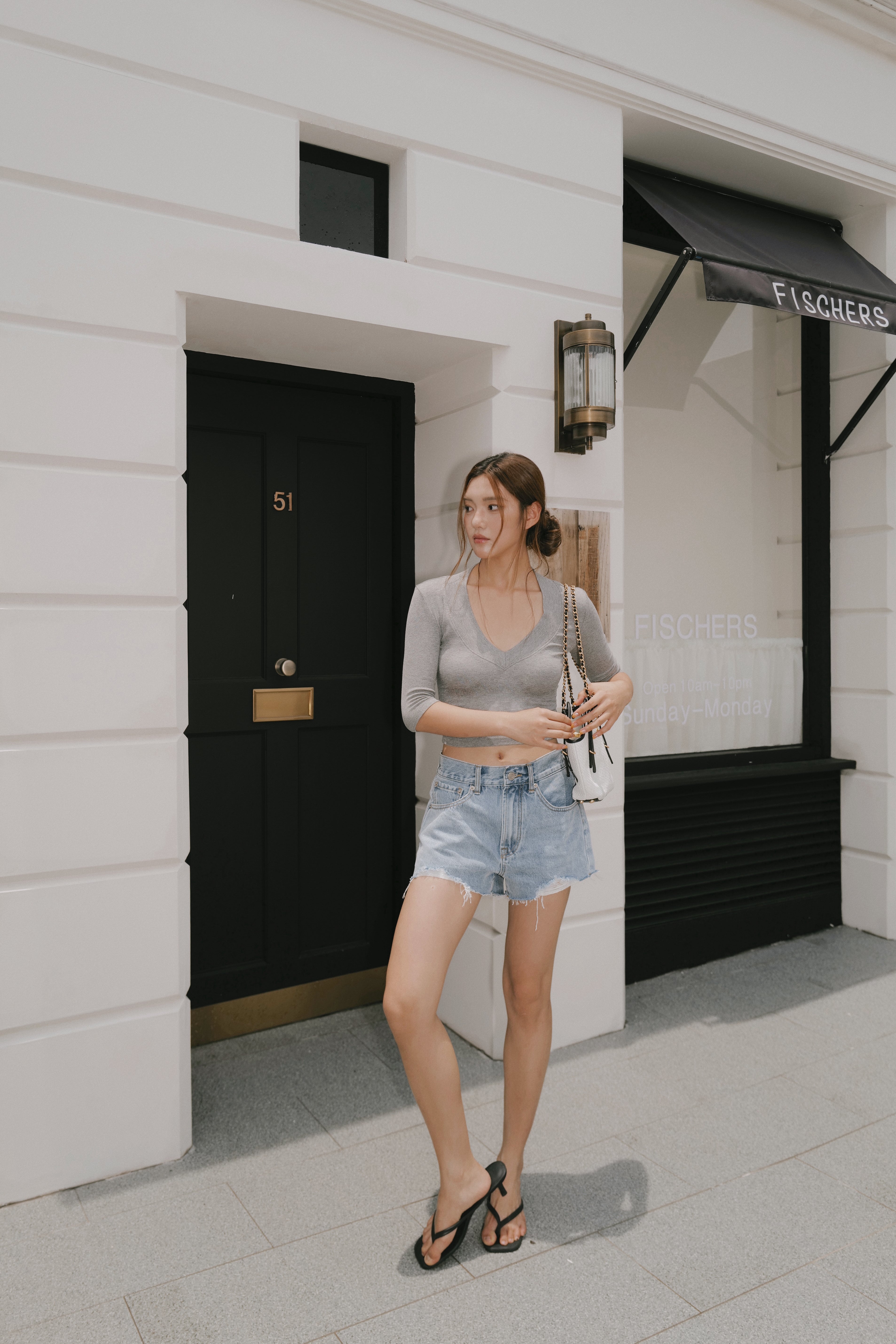 Asymmetric Distressed Denim Shorts